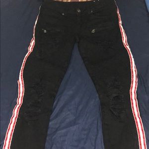 Black ripped Jeans with red and white stripes
